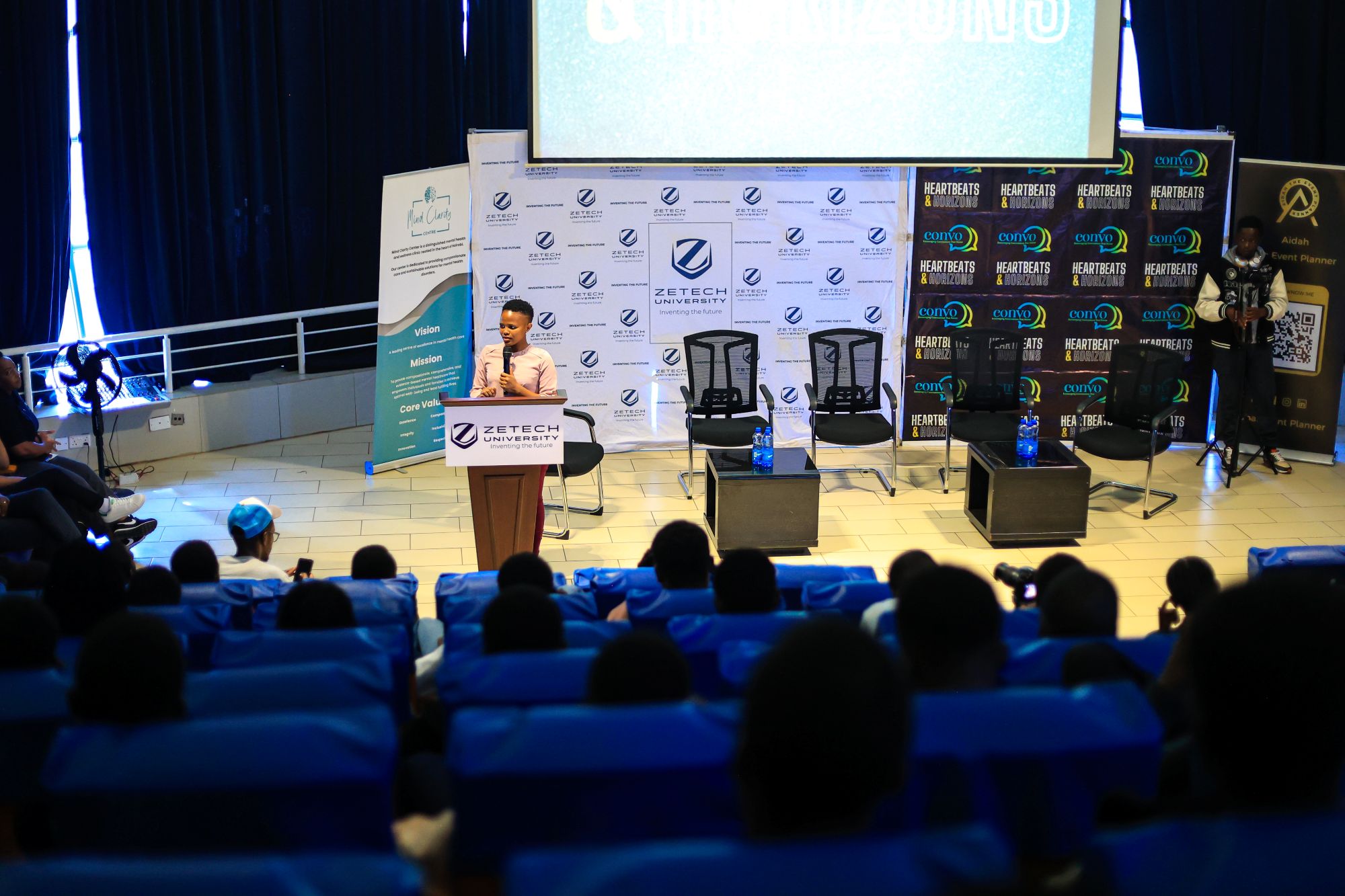 Fridah Wachira speaking at a Heartbeats and Horizons event at zetech university
